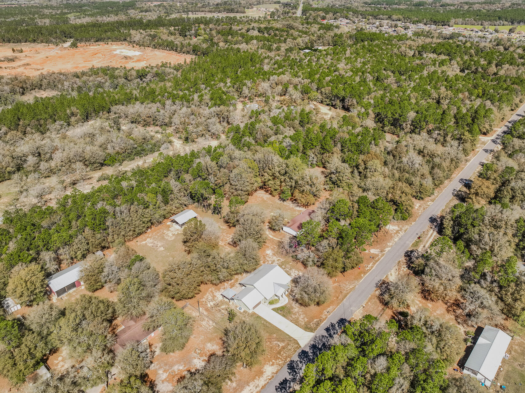 5346 Fox Hound Lane Baker, FL 32531 - Photo 39 of 46 a view of a lake with a yard
