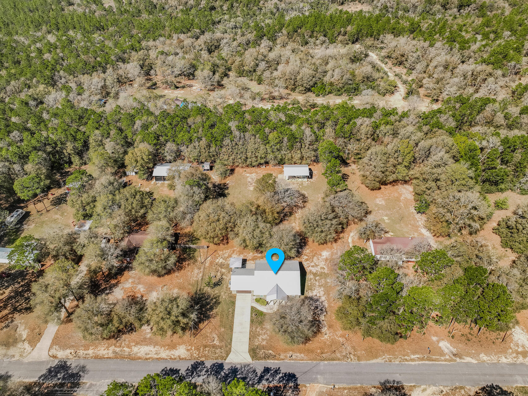 5346 Fox Hound Lane Baker, FL 32531 - Photo 43 of 46 a aerial view of a house with a yard