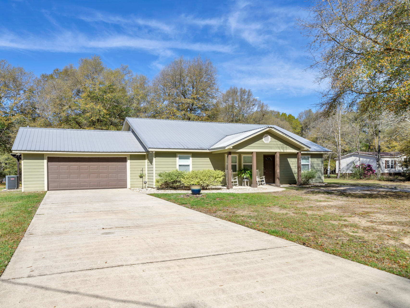 5346 Fox Hound Lane Baker, FL 32531 - Photo 6 of 46 front view of house with a yard