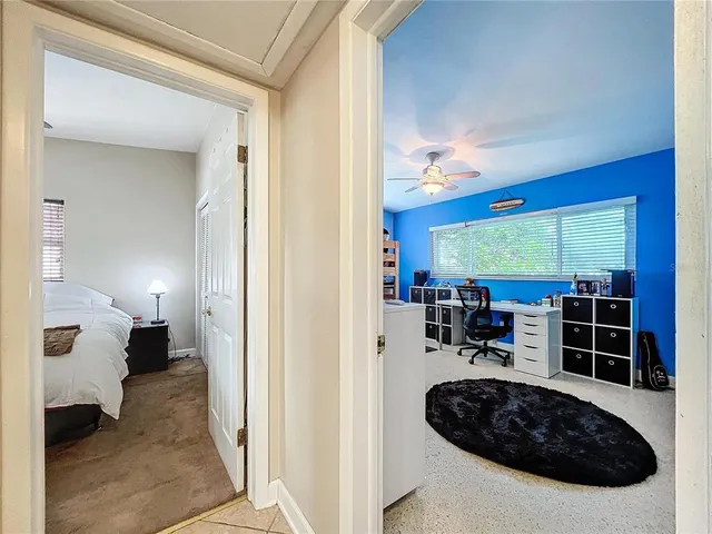 a view of a livingroom with furniture and a window