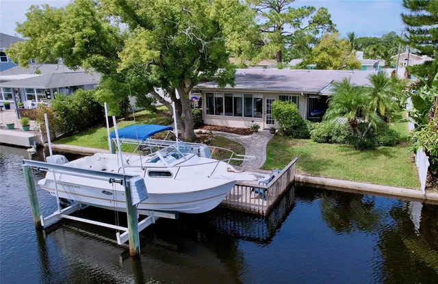 an aerial view of a chairs and table on the terrace