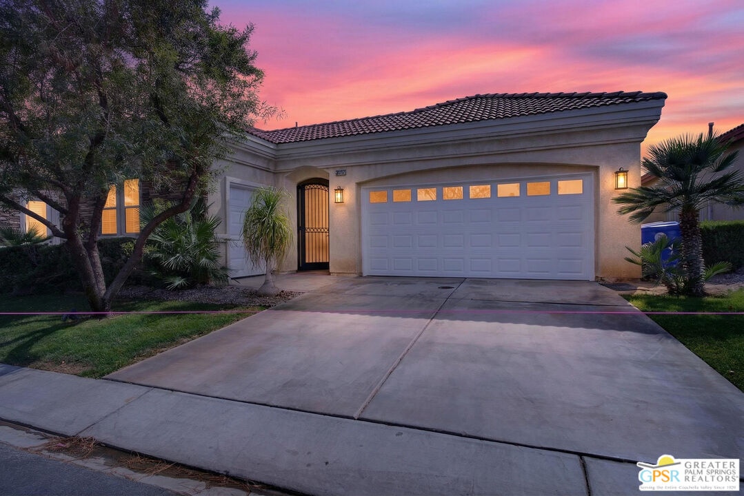 82717 Barrymore Street Indio, CA 92201 - Photo 2 of 26 a front view of a house