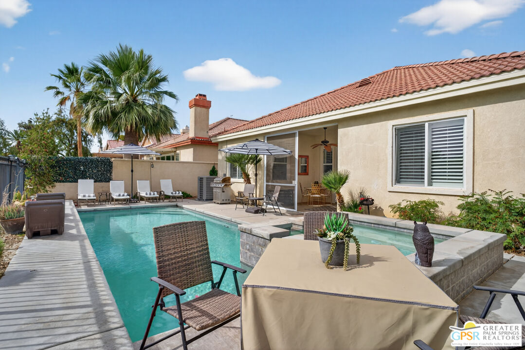 82717 Barrymore Street Indio, CA 92201 - Photo 21 of 26 a view of a house with backyard and sitting area