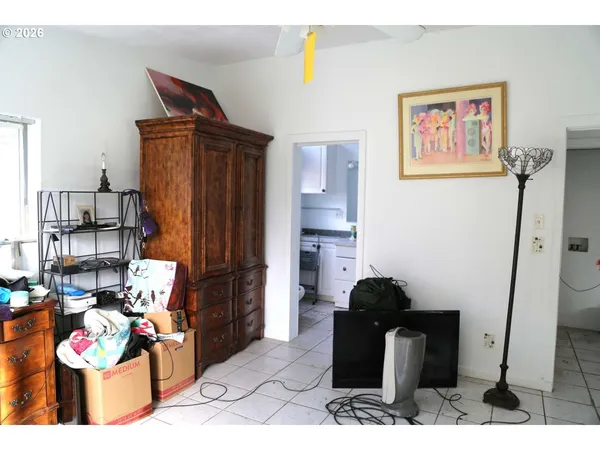 a view of a living room with closet