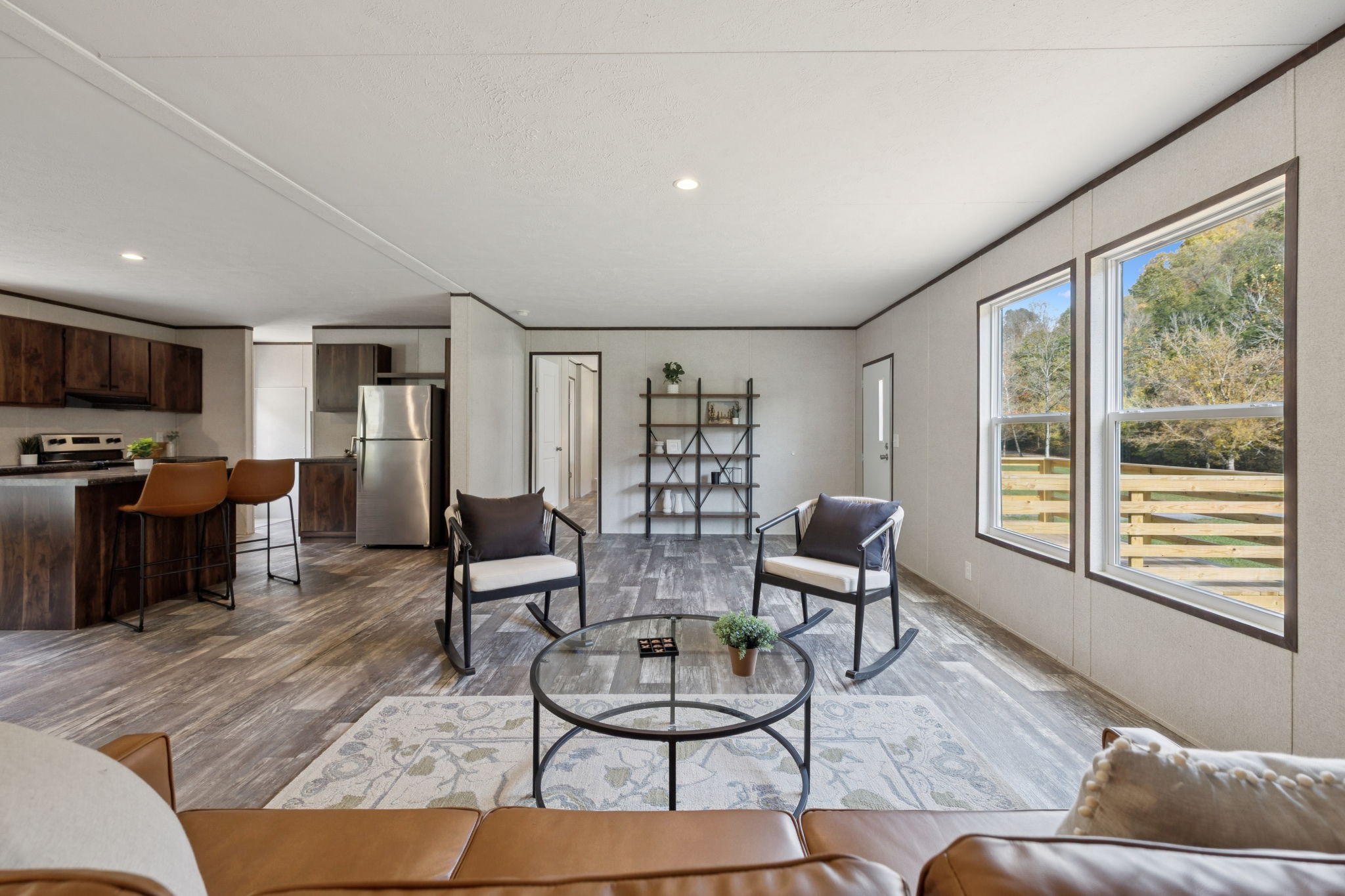825 Gaulden Hollow Road Lafayette, TN 37083 - Photo 17 of 51 a living room with furniture and a flat screen tv