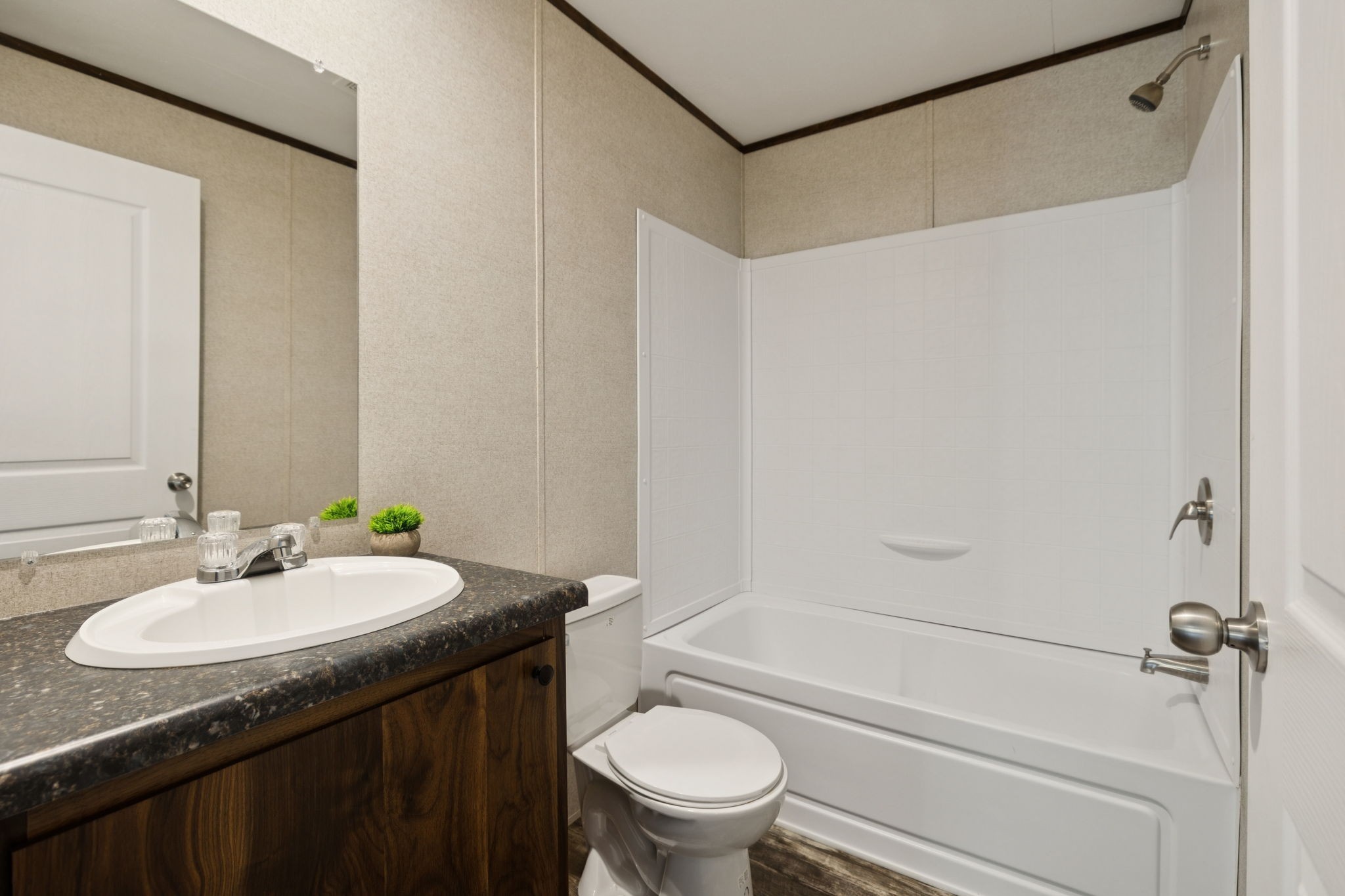 825 Gaulden Hollow Road Lafayette, TN 37083 - Photo 35 of 51 a bathroom with a granite countertop sink toilet and shower