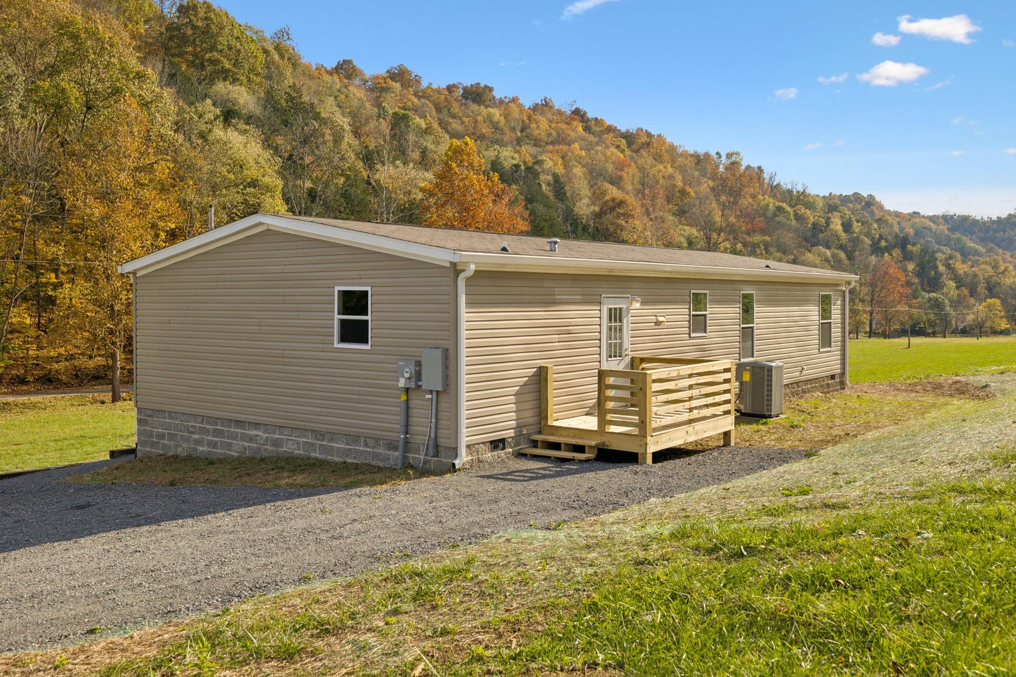 825 Gaulden Hollow Road Lafayette, TN 37083 - Photo 41 of 51 a front view of a house with a yard
