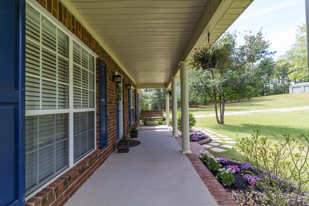 2710 Ginger Branch Road Thomson, GA 30824 - Photo 13 of 47 FRONT PORCH WITH SWING