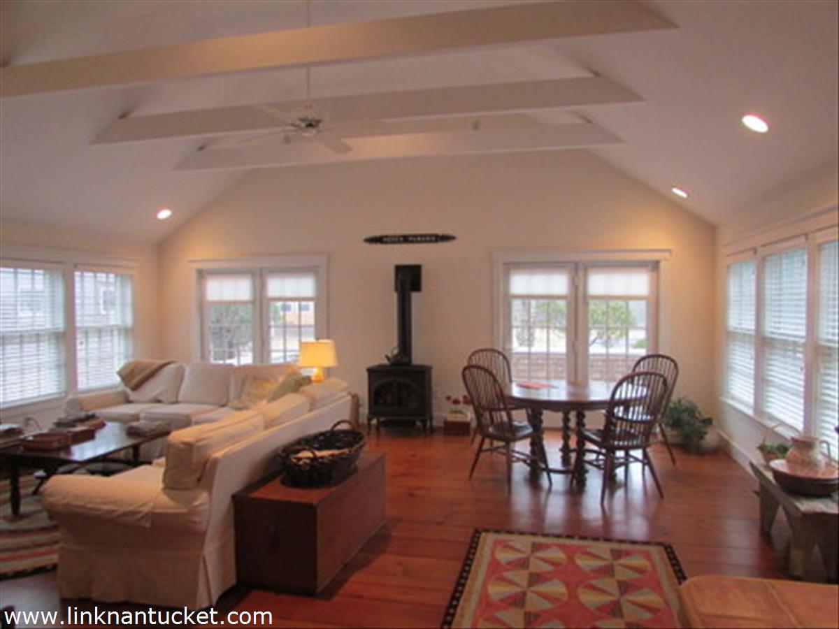 73 Fairgrounds Road Nantucket, MA 02554 - Photo 3 of 15 a living room with furniture and wooden floor