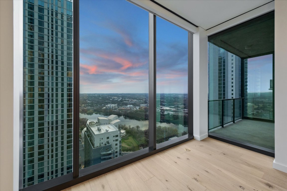 610 Davis Street, Unit 3005 Austin, TX 78701 - Photo 9 of 24 a view of a glass door and porch