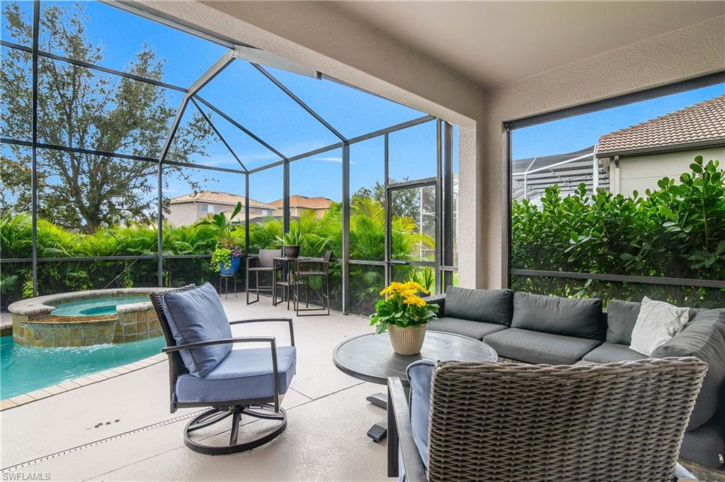 12454 Rock Ridge Lane Fort Myers, FL 33913 - Photo 23 of 37 a outdoor living space with furniture and garden view