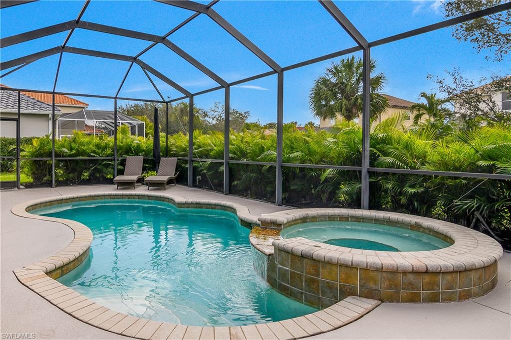12454 Rock Ridge Lane Fort Myers, FL 33913 - Photo 24 of 37 a view of a swimming pool with a patio