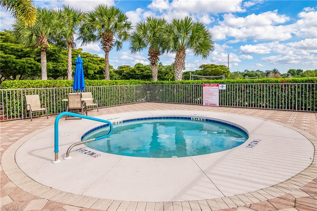 12454 Rock Ridge Lane Fort Myers, FL 33913 - Photo 30 of 37 a view of a swimming pool with a patio