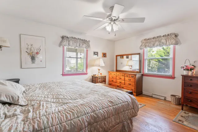 a view of bathroom with a shower and a sink