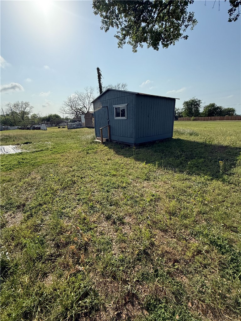 507 Logan Street Calvert, TX 77837 - Photo 17 of 19 a wooden fence with lake view
