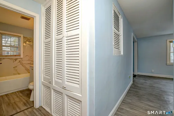 a view of a bedroom with a window