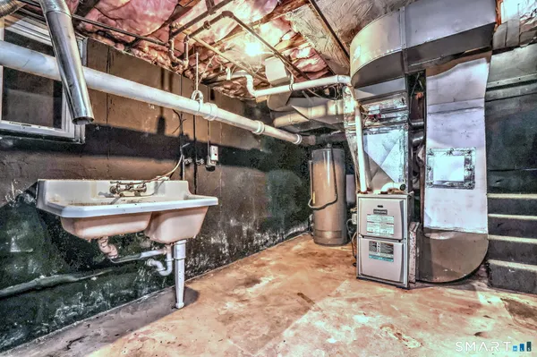 a view of a chairs and table in the patio