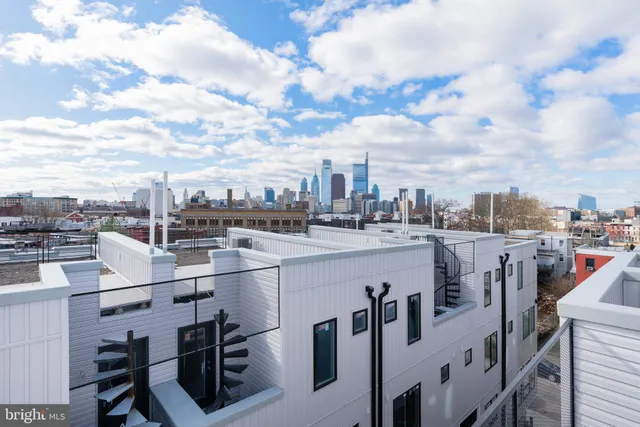 a view of building with a window and a door