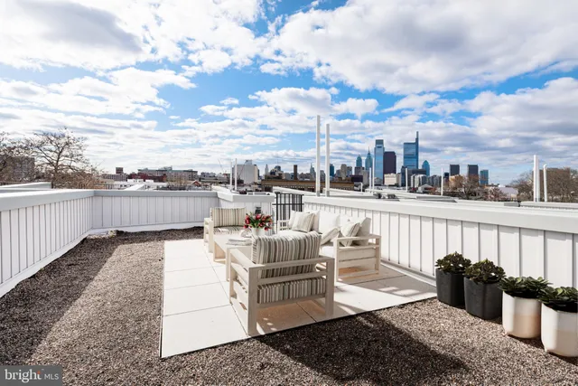 a view of a terrace with furniture
