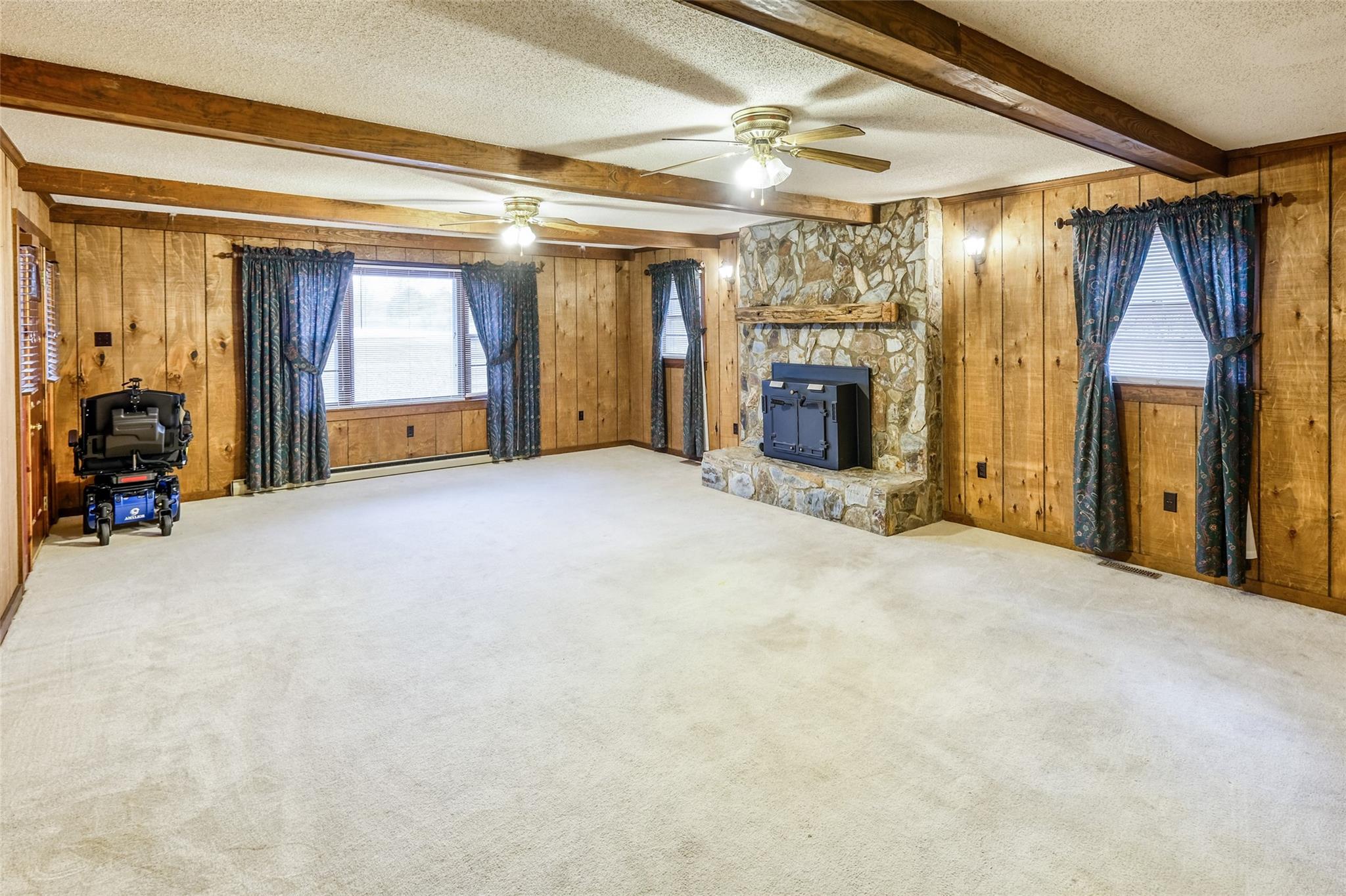200 Johnson Dairy Road Rockwell, NC 28138 - Photo 17 of 36 a view of a livingroom with a fireplace cabinet and a window