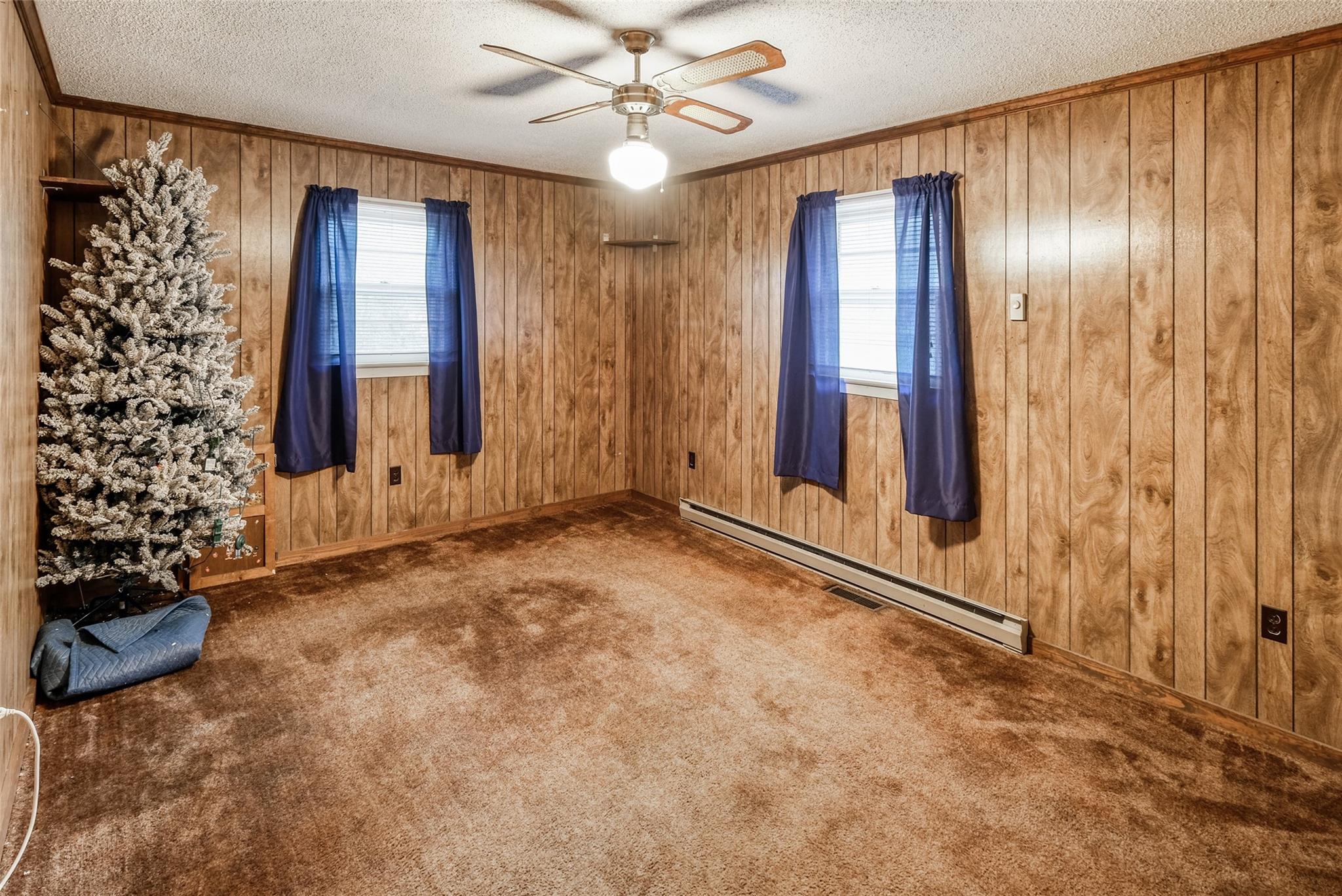 200 Johnson Dairy Road Rockwell, NC 28138 - Photo 19 of 36 wooden floor and window in an empty room
