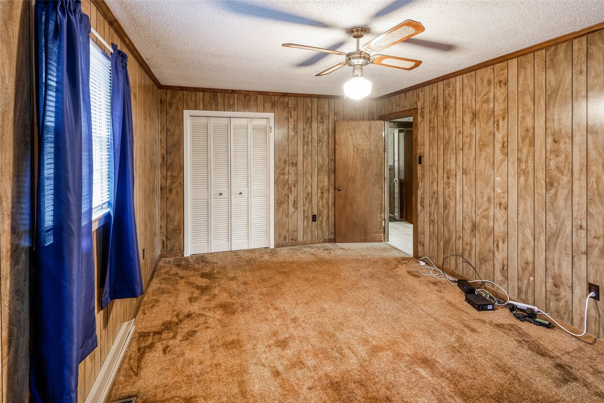 200 Johnson Dairy Road Rockwell, NC 28138 - Photo 20 of 36 a view of a livingroom with a ceiling fan and window