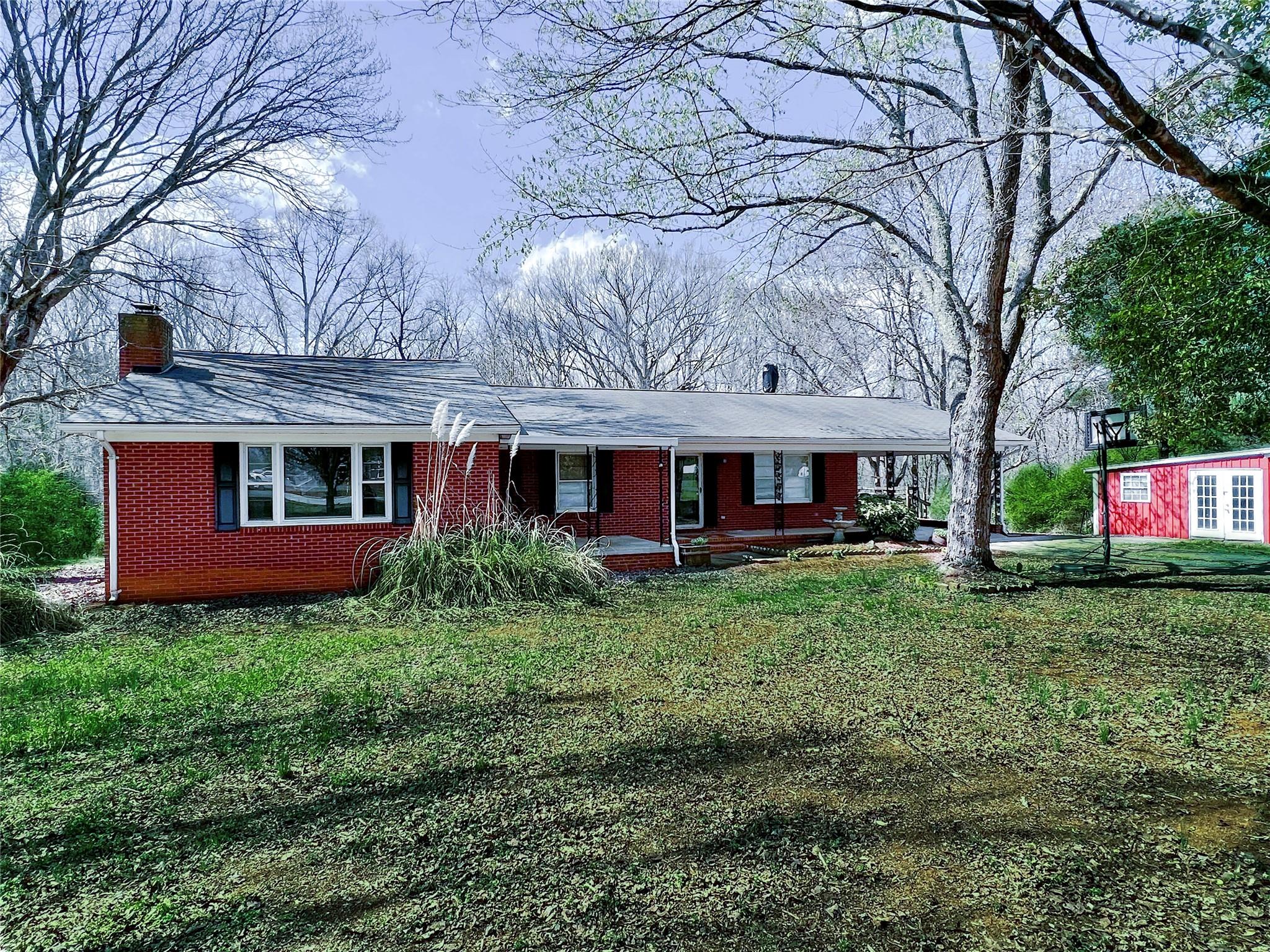 200 Johnson Dairy Road Rockwell, NC 28138 - Photo 2 of 36 a front view of a house with garden
