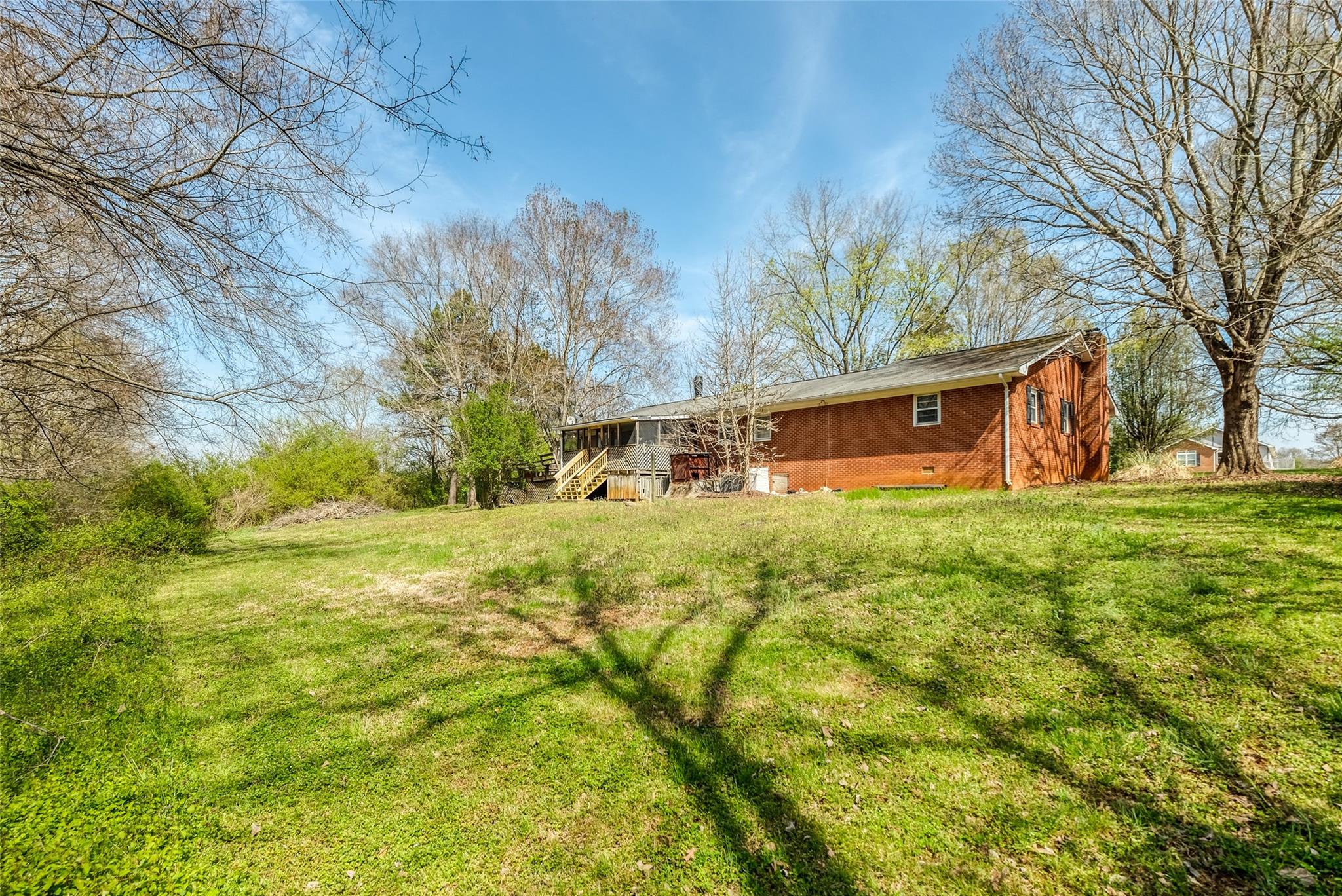200 Johnson Dairy Road Rockwell, NC 28138 - Photo 26 of 36 a view of a house with a yard