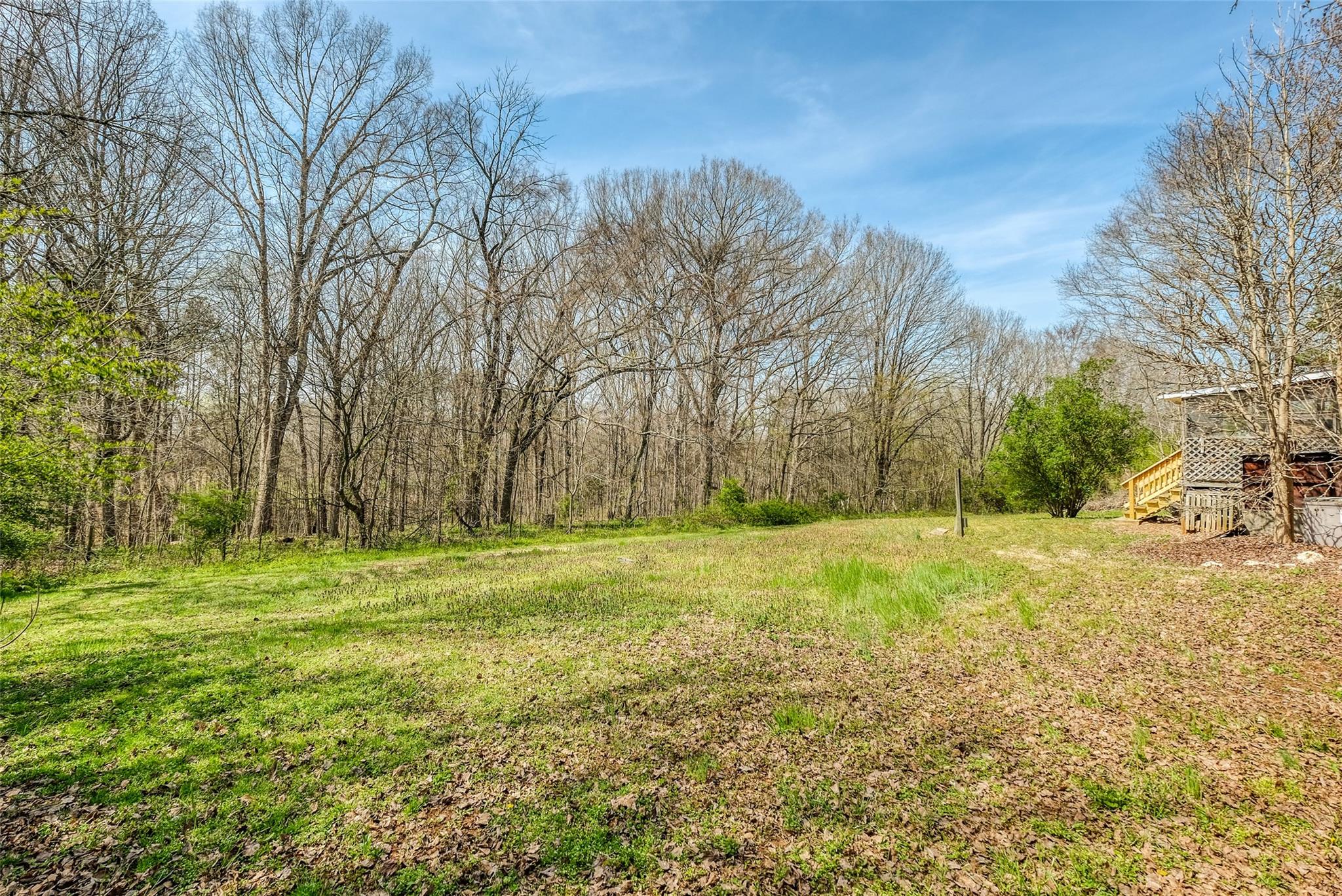 200 Johnson Dairy Road Rockwell, NC 28138 - Photo 27 of 36 a yard with trees in the background