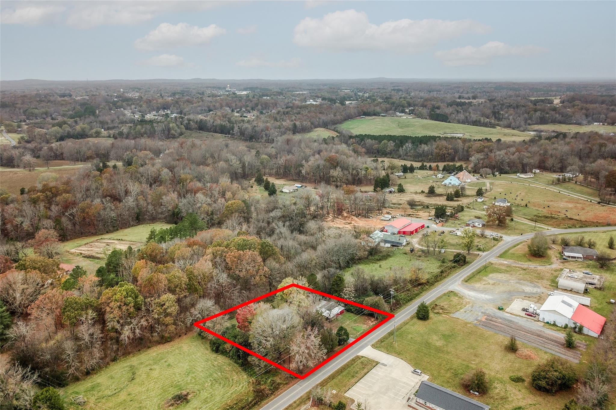 200 Johnson Dairy Road Rockwell, NC 28138 - Photo 33 of 36 an aerial view of residential houses with outdoor space and trees