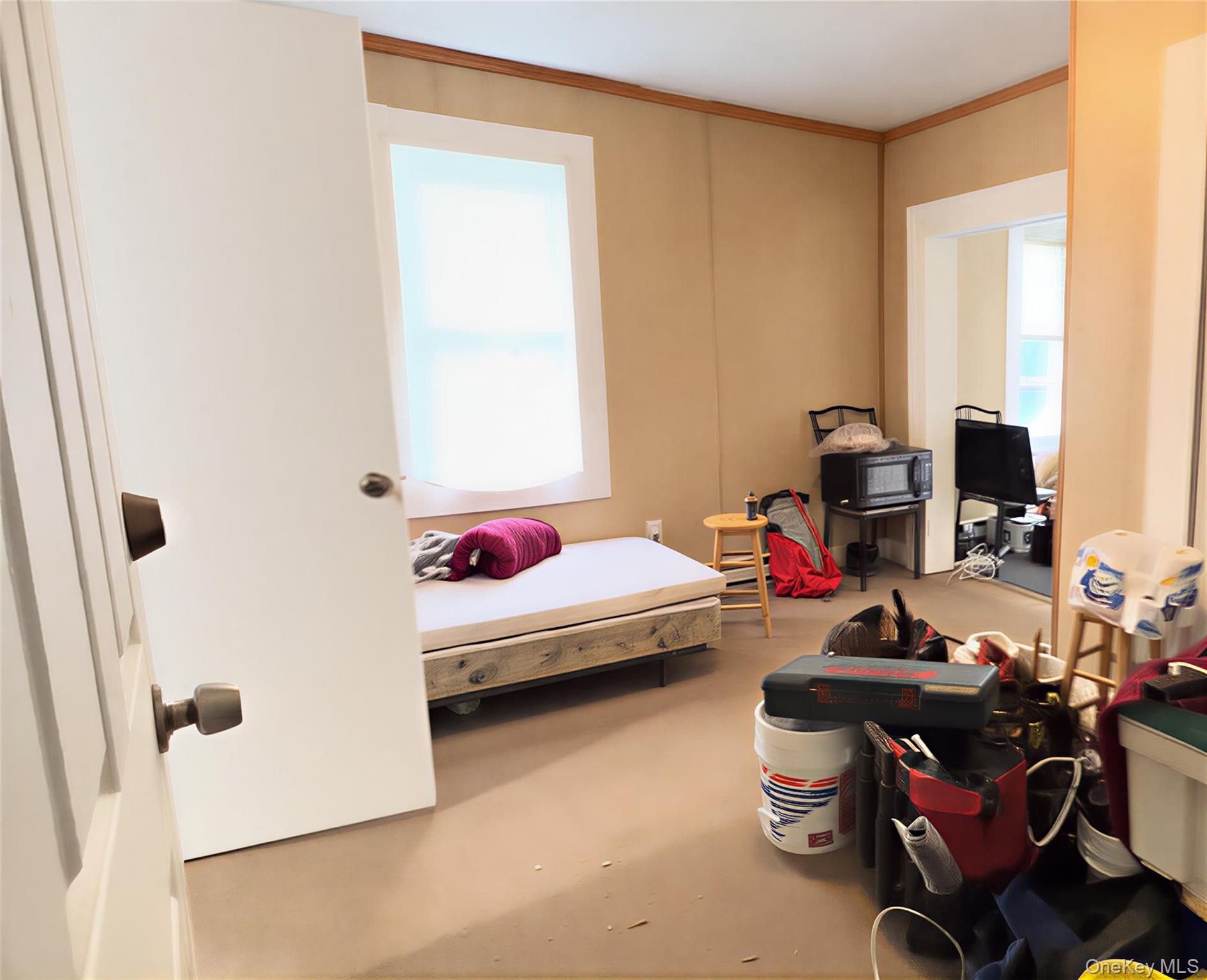 19 Old Greenfield Road, Unit 1 Ellenville, NY 12428 - Photo 5 of 6 a bedroom with furniture and a window