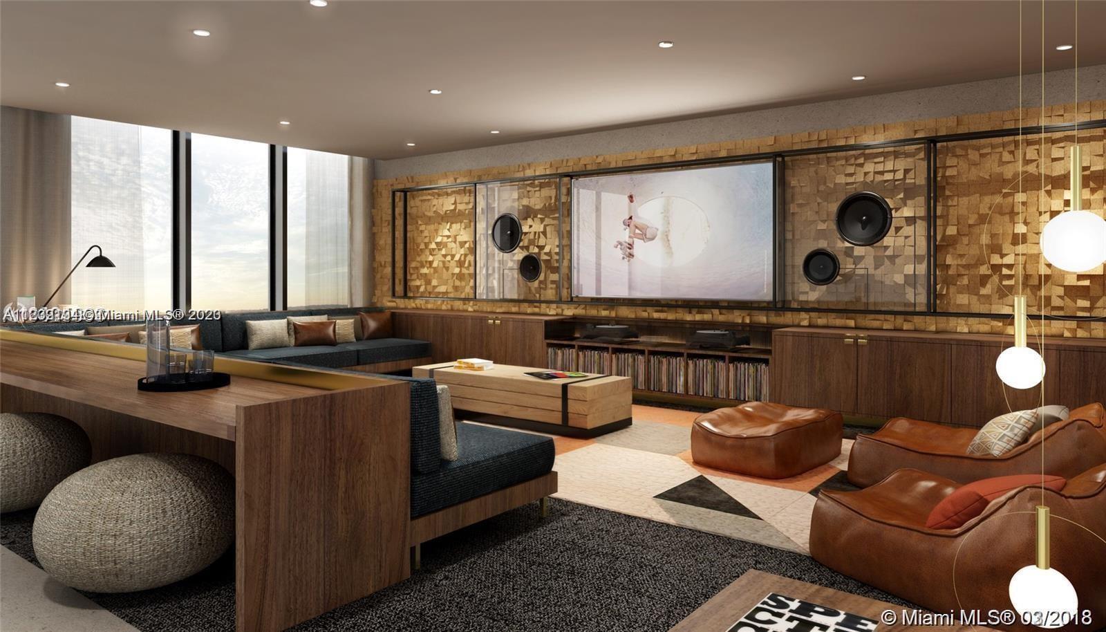 Midtown Miami Miami, FL 33137 - Photo 19 of 23 a kitchen with stainless steel appliances granite countertop a sink and a refrigerator