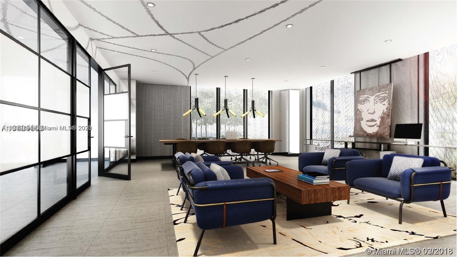 Midtown Miami Miami, FL 33137 - Photo 20 of 23 a living room with furniture and a large window