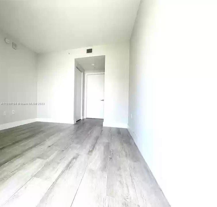 Midtown Miami Miami, FL 33137 - Photo 5 of 23 a view of a room with wooden floor