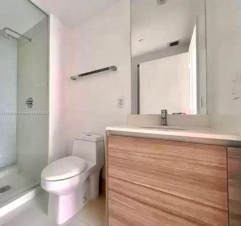 Midtown Miami Miami, FL 33137 - Photo 6 of 23 a bathroom with a sink toilet and shower