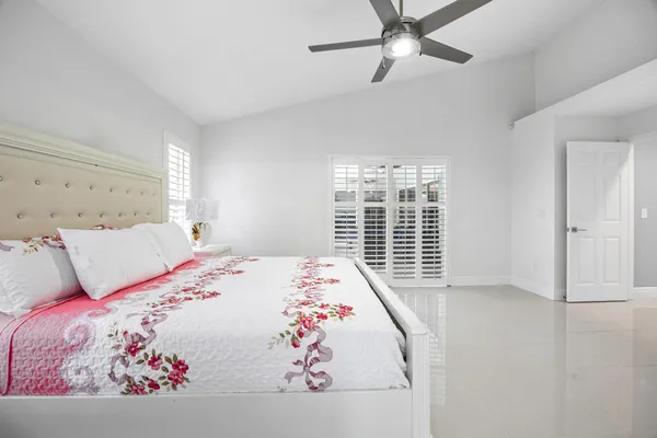 a kitchen with stainless steel appliances kitchen island granite countertop a sink stove and cabinets