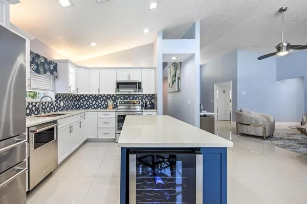 a outdoor space with patio the couches and dining table with garden view