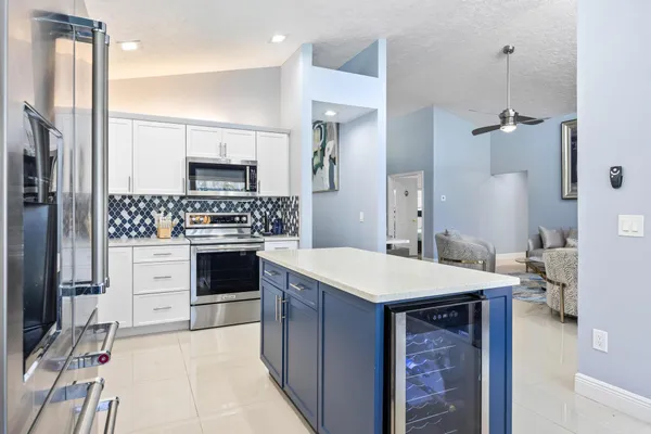 a view of a backyard with sitting area