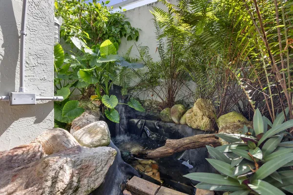 an aerial view of a houses with city view