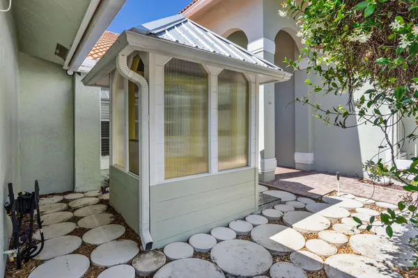 an aerial view of a houses with city view