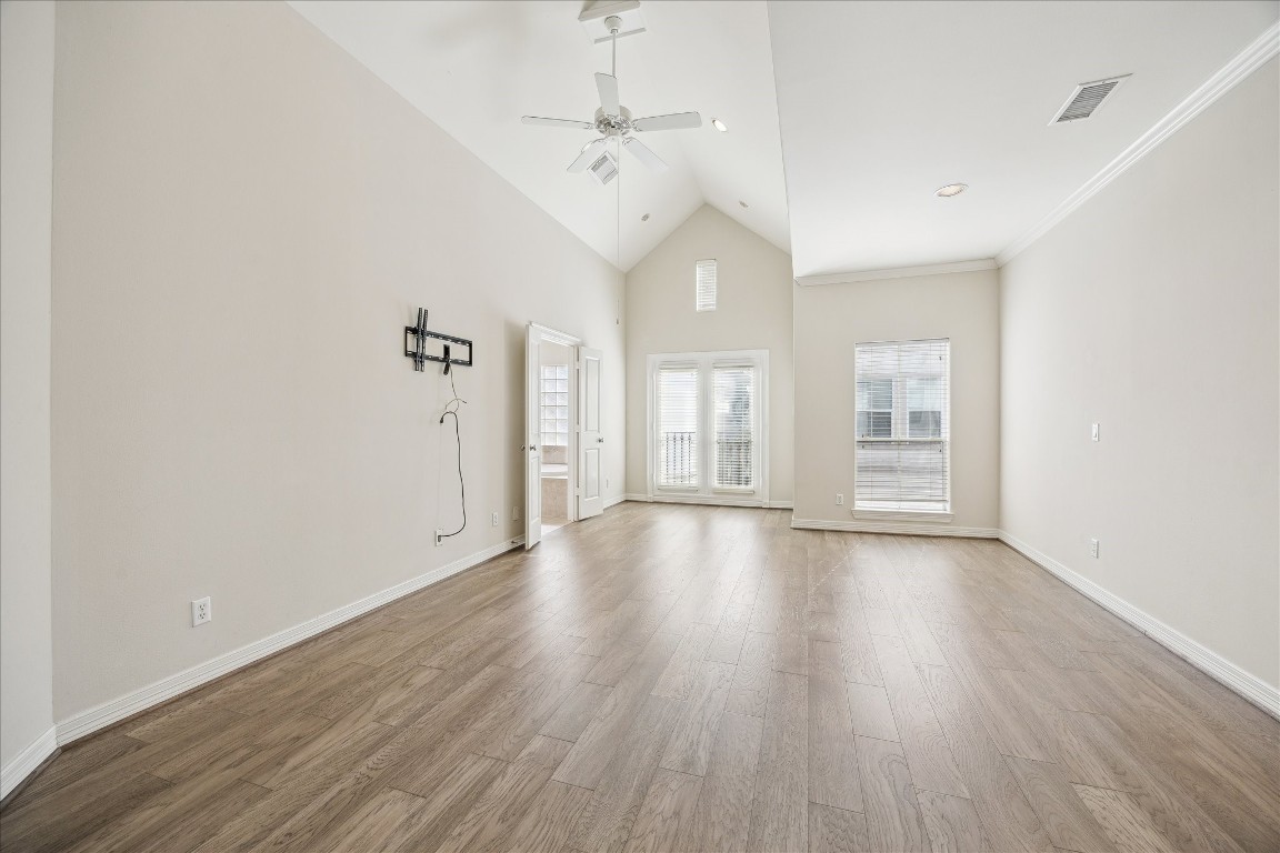 633 Hartman Street Houston, TX 77007 - Photo 12 of 23 wooden floor in an empty room with a window