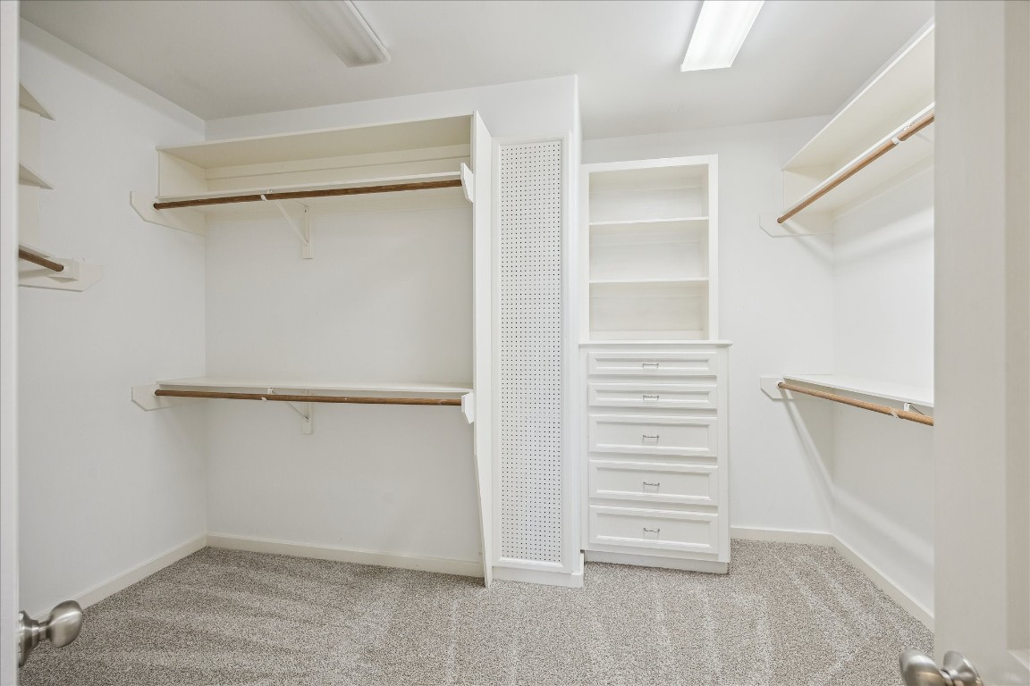 633 Hartman Street Houston, TX 77007 - Photo 17 of 23 a view of an empty walk in closet