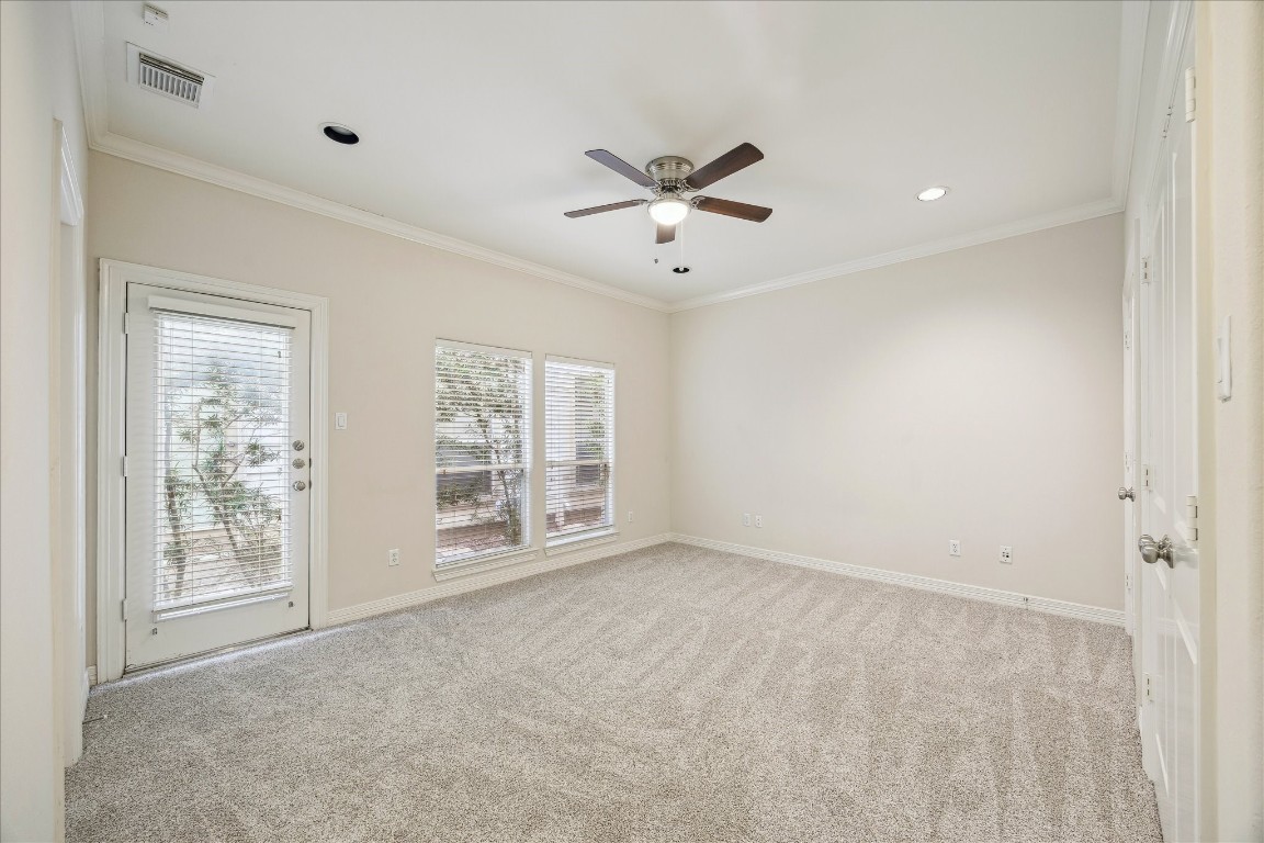 633 Hartman Street Houston, TX 77007 - Photo 4 of 23 a view of an empty room with a window
