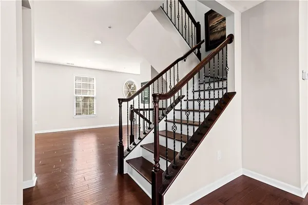 a view of entryway with wooden floor