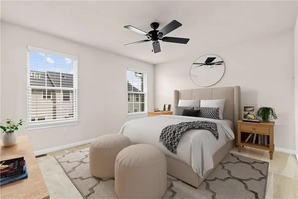 a bed room with a bed and a window