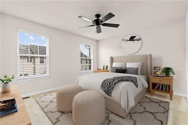 a bed room with a bed and a window