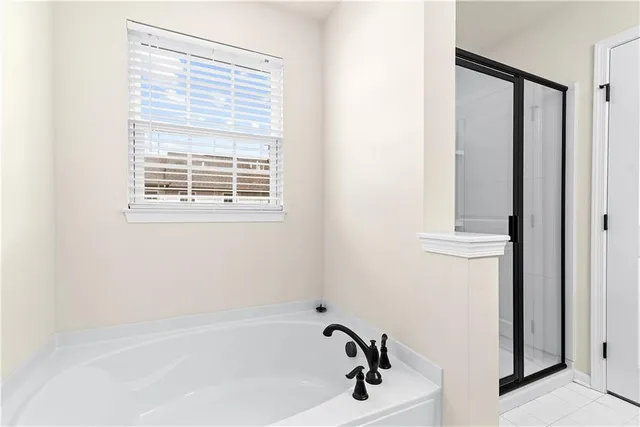 a bathroom with a bathtub