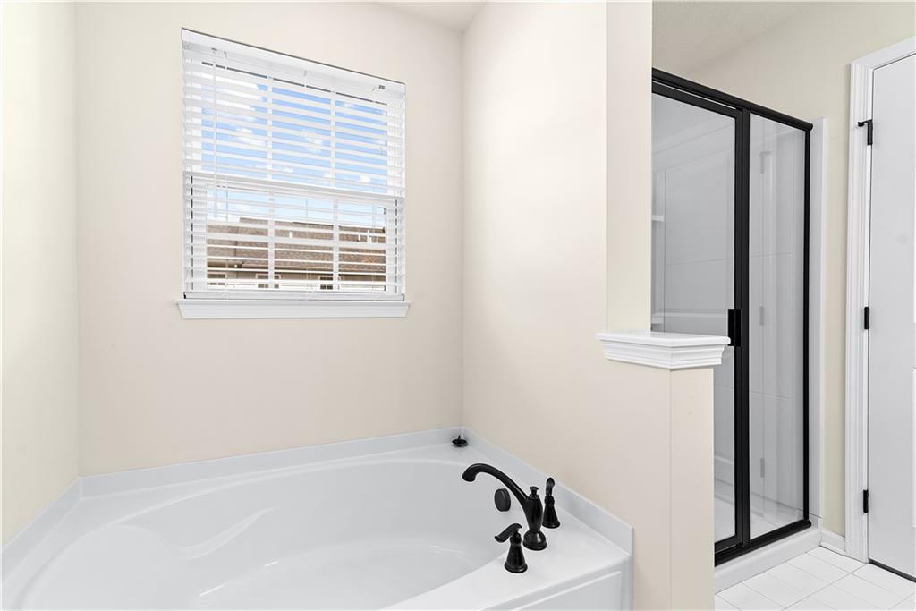 1703 Pointe View Drive Mars, PA 16046 - Photo 15 of 21 a bathroom with a bathtub