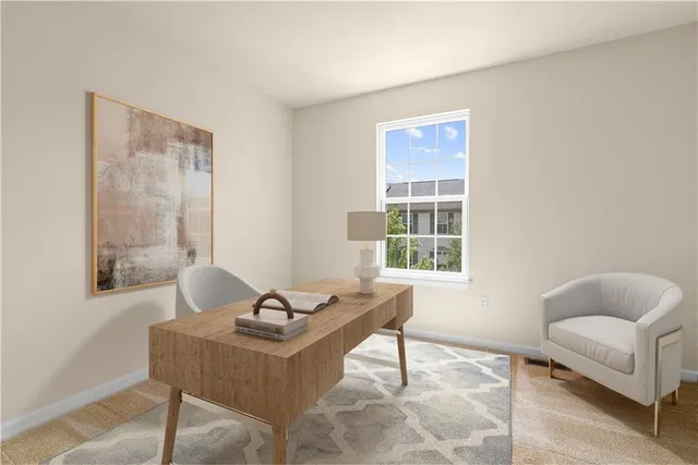 a living room with furniture and window