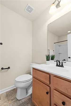 a bathroom with a sink and a toilet